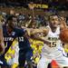 Michigan sophomore Jon Horford reaches for a loose ball in the game against Illinois on Sunday, Feb. 24. Daniel Brenner I AnnArbor.com